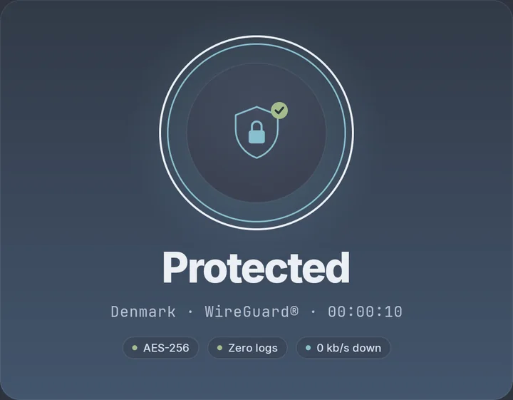 Home screen status when connected: the shield with a tick, the location Denmark, WireGuard and 00:00:10, and AES-256, Zero logs and download speed chips
